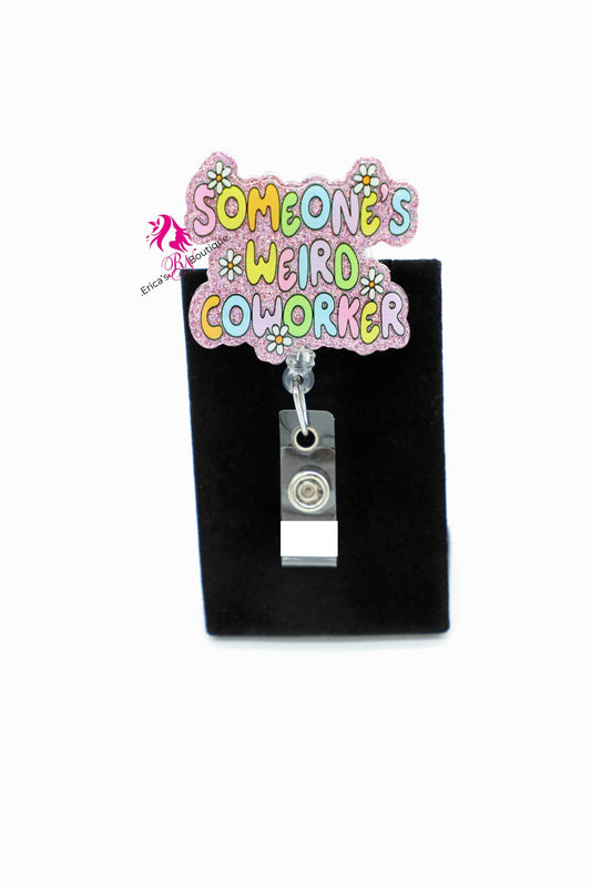 Glittery pop of humor that reads “Someone’s Weird Coworker” Pastel bubble letters sparkle against a pink shimmer background, dotted with tiny daisy accents. The smooth retractable badge cord pulls with an easy glide for quick scans, then snaps back neatly. It’s a fun, confidence-boosting ID holder for any healthcare worker who keeps the unit laughing while getting things done. Clip it on and let the playful “weird coworker” vibe do the icebreaking for you in halls, break rooms, and busy stations